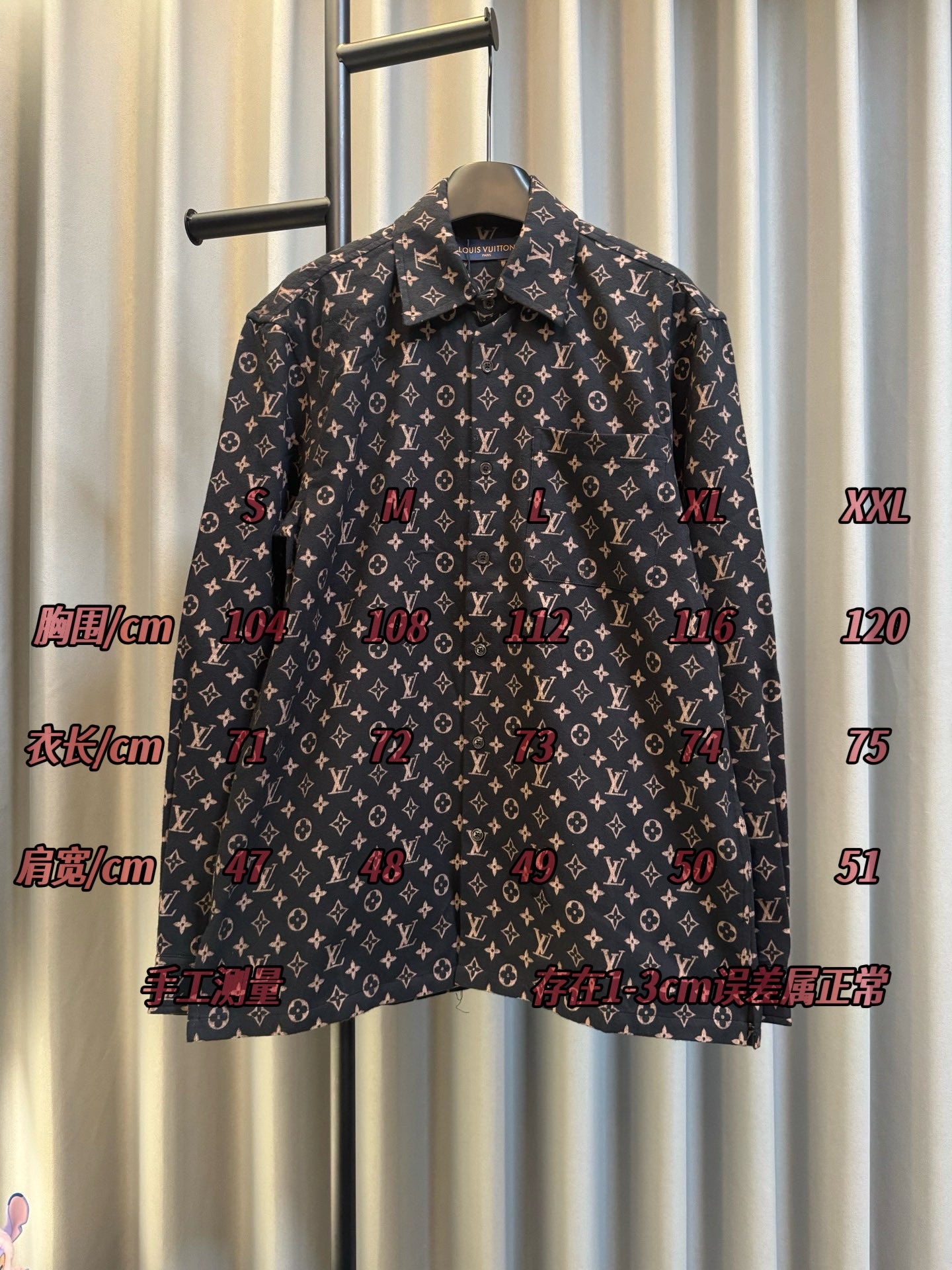 Long-sleeve jacket on hanger in dark navy with Louis Vuitton monogram print