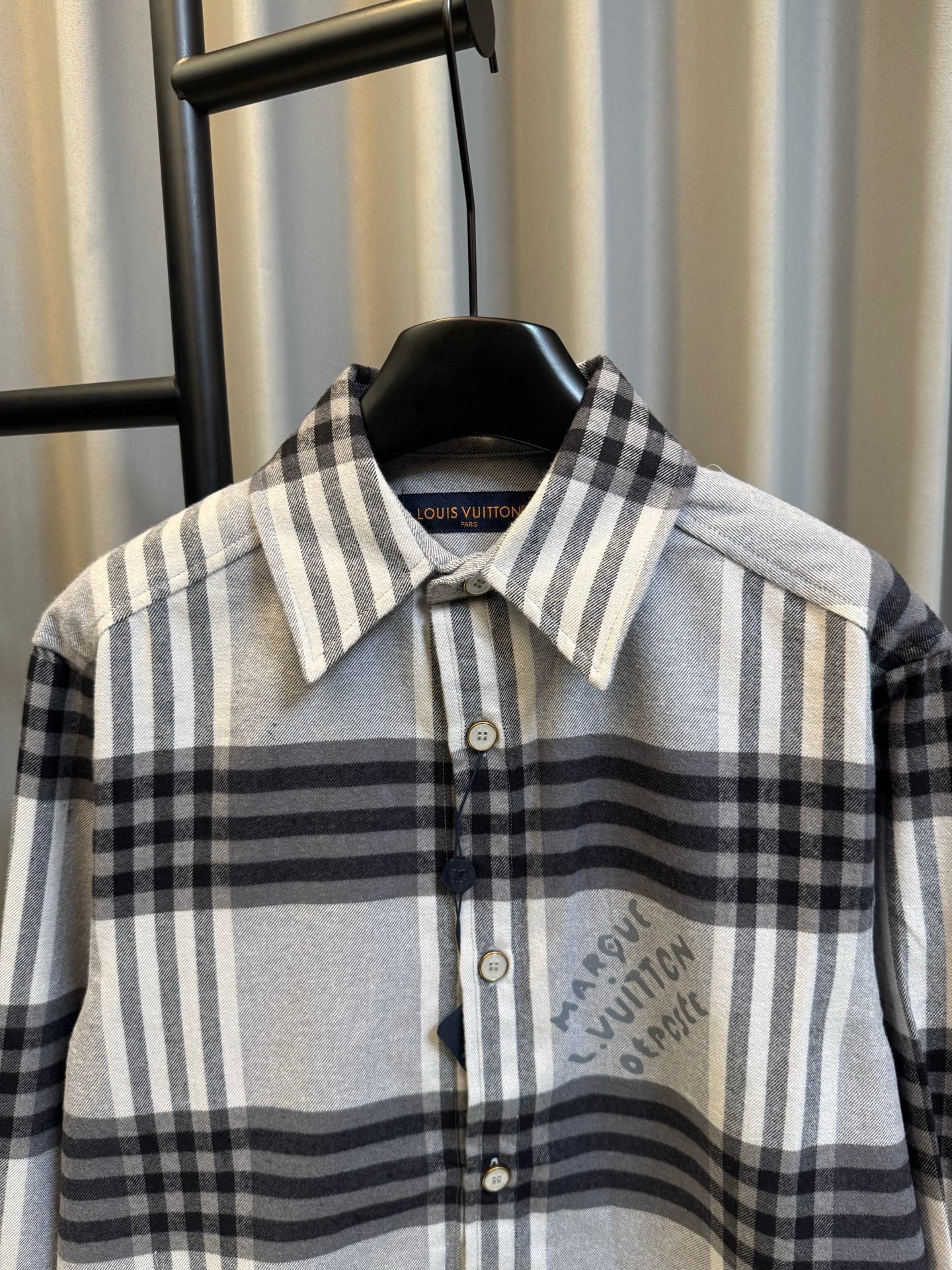 Louis Vuitton plaid button-up shirt with collar and chest logo graphic