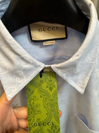 Gucci light blue monogram short-sleeve button-up shirt, neck label and interior tag