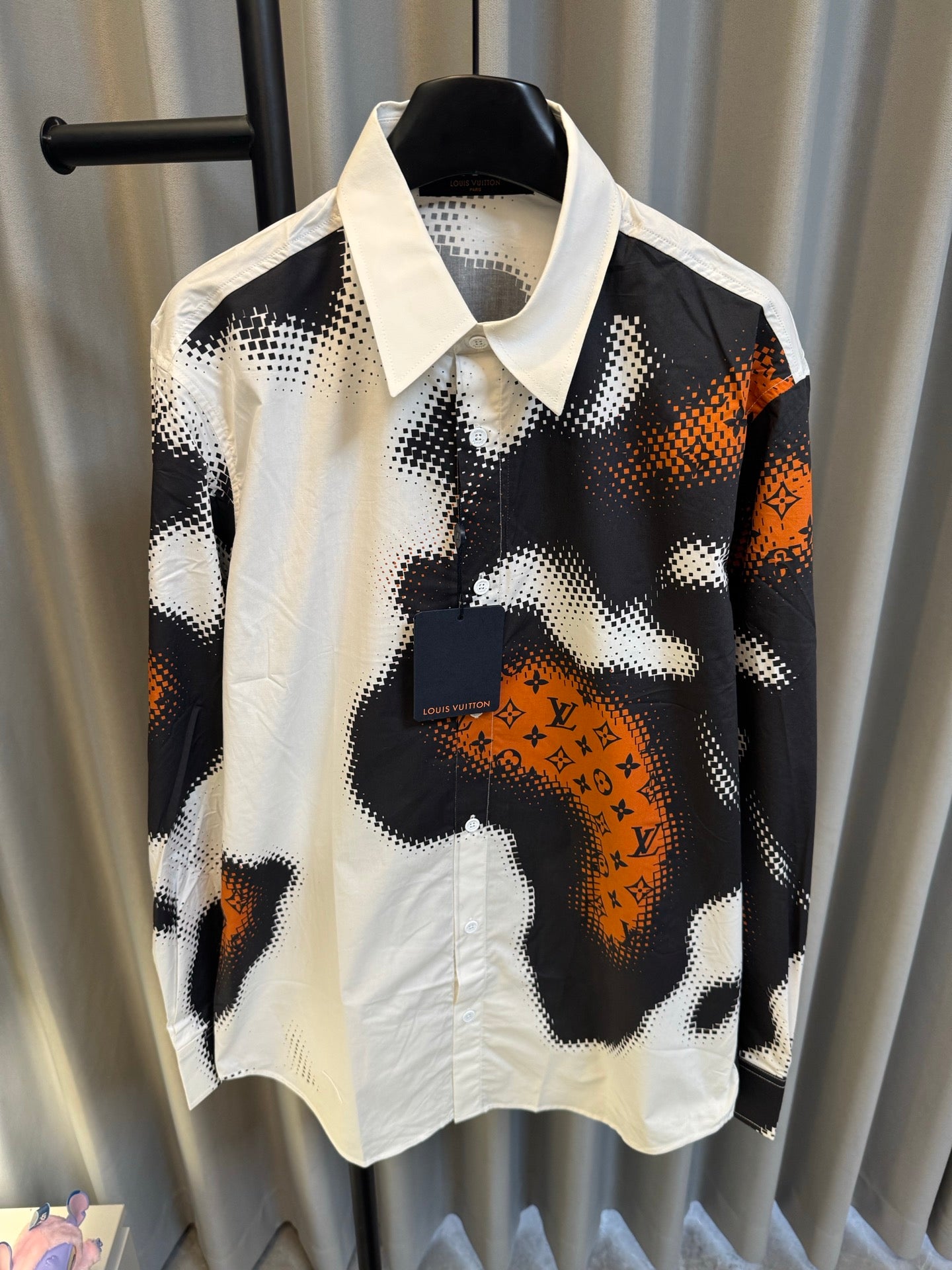 Louis Vuitton long-sleeve shirt with white collar and black/orange abstract camo print