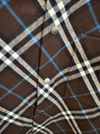 Burberry plaid shirt button detail, dark brown with blue and white check placket