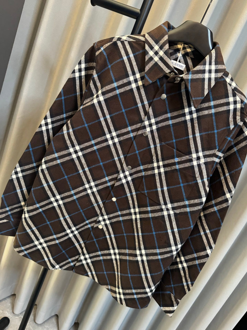 Burberry plaid long-sleeve shirt close-up, dark brown, blue and white check pattern