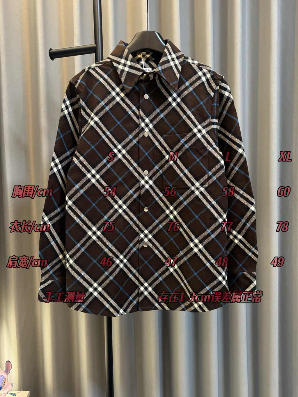 Burberry plaid long-sleeve button-up shirt, dark brown with blue and white checks on hanger