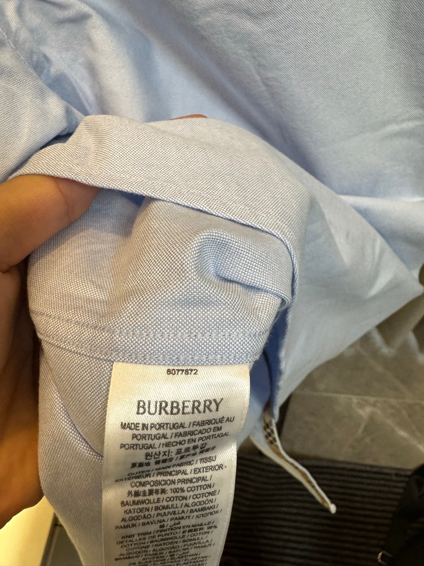 Burberry size and care label inside light blue shirt collar