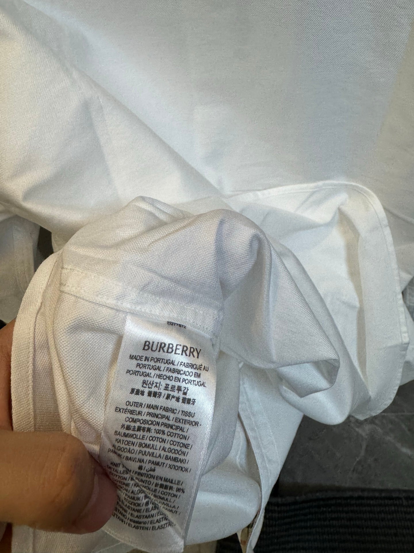 Burberry shirt, white, care label and interior tag near collar
