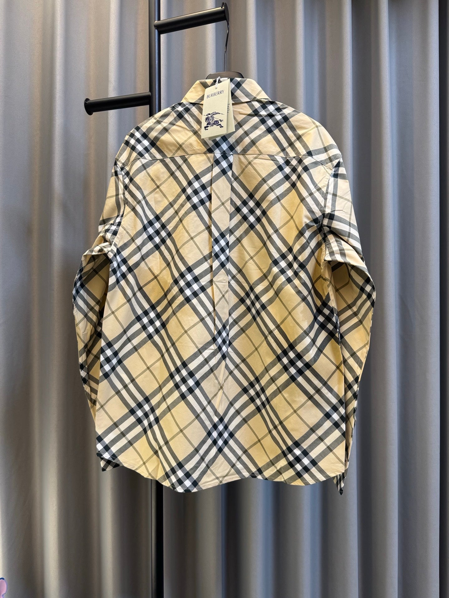 Burberry plaid button-up shirt, tan base with navy check pattern and long sleeves