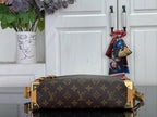 Louis Vuitton monogram handbag with tan leather trim and gold top handles