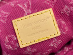 Louis Vuitton made in France patch on pink monogram fabric with yellow stitched border.