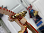 Beige strap with gold clasp and Louis Vuitton logo hardware