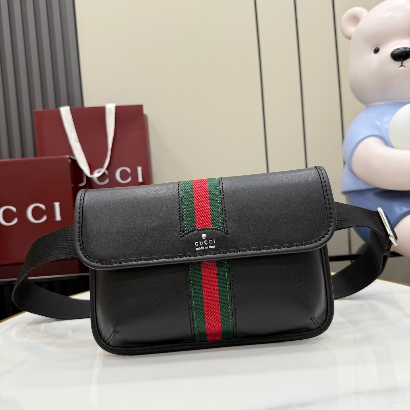 Gucci black crossbody bag with front flap and green-red web stripe