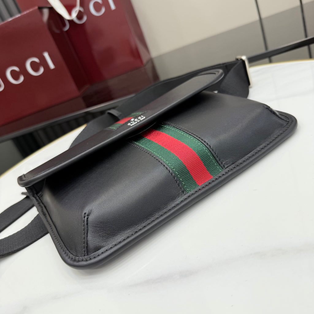 Gucci black leather bag with green-red web stripe on the flap