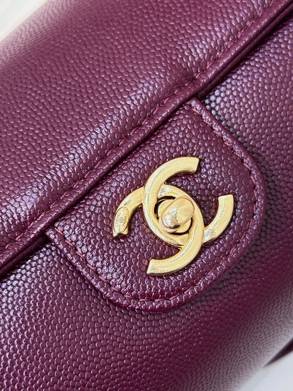 Burgundy leather mini bag gold CC clasp on textured flap panel