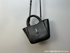 YSL tote bag with detachable shoulder strap, top handles, and gold-tone logo charm
