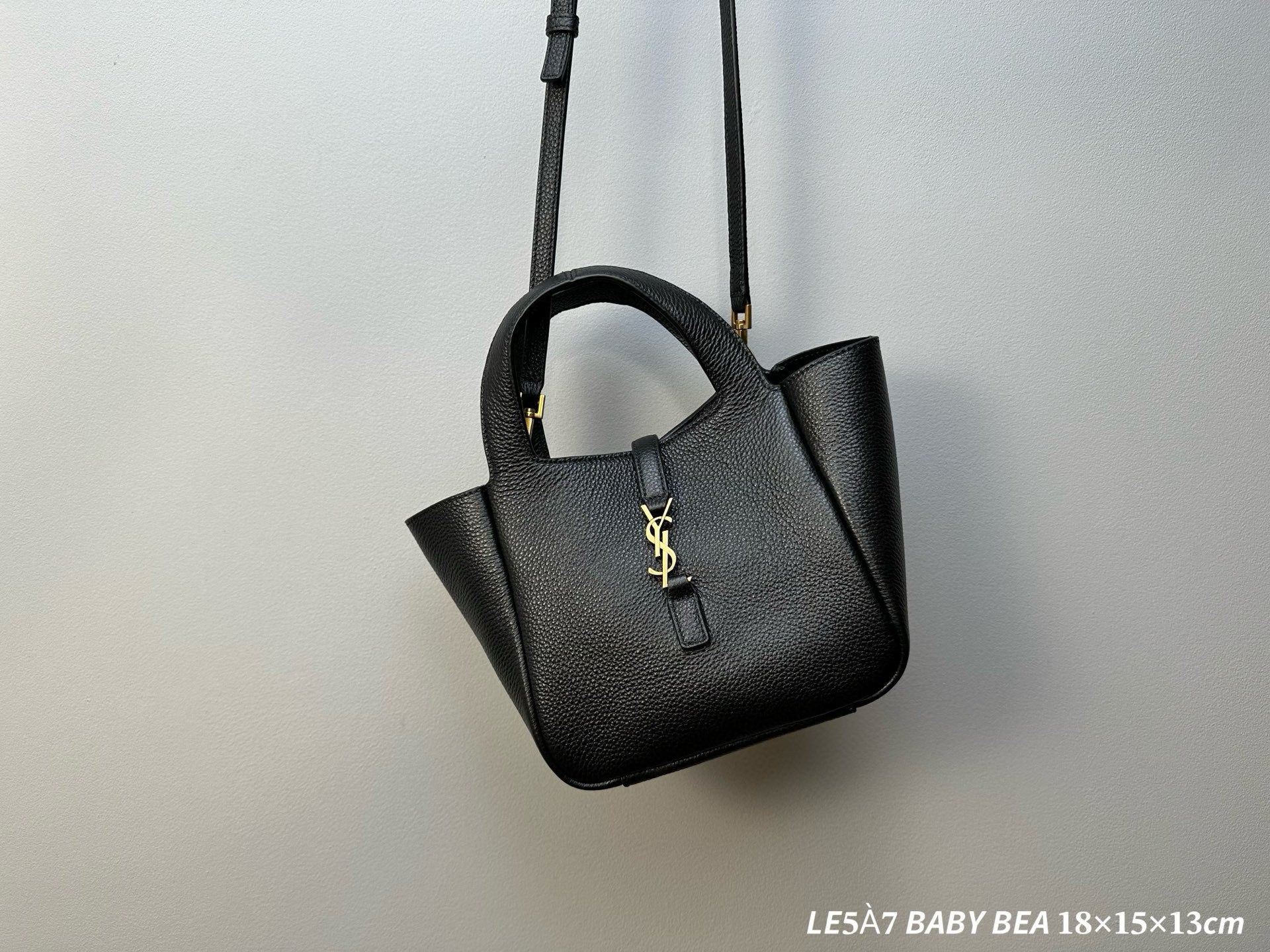 YSL tote bag with detachable shoulder strap, top handles, and gold-tone logo charm