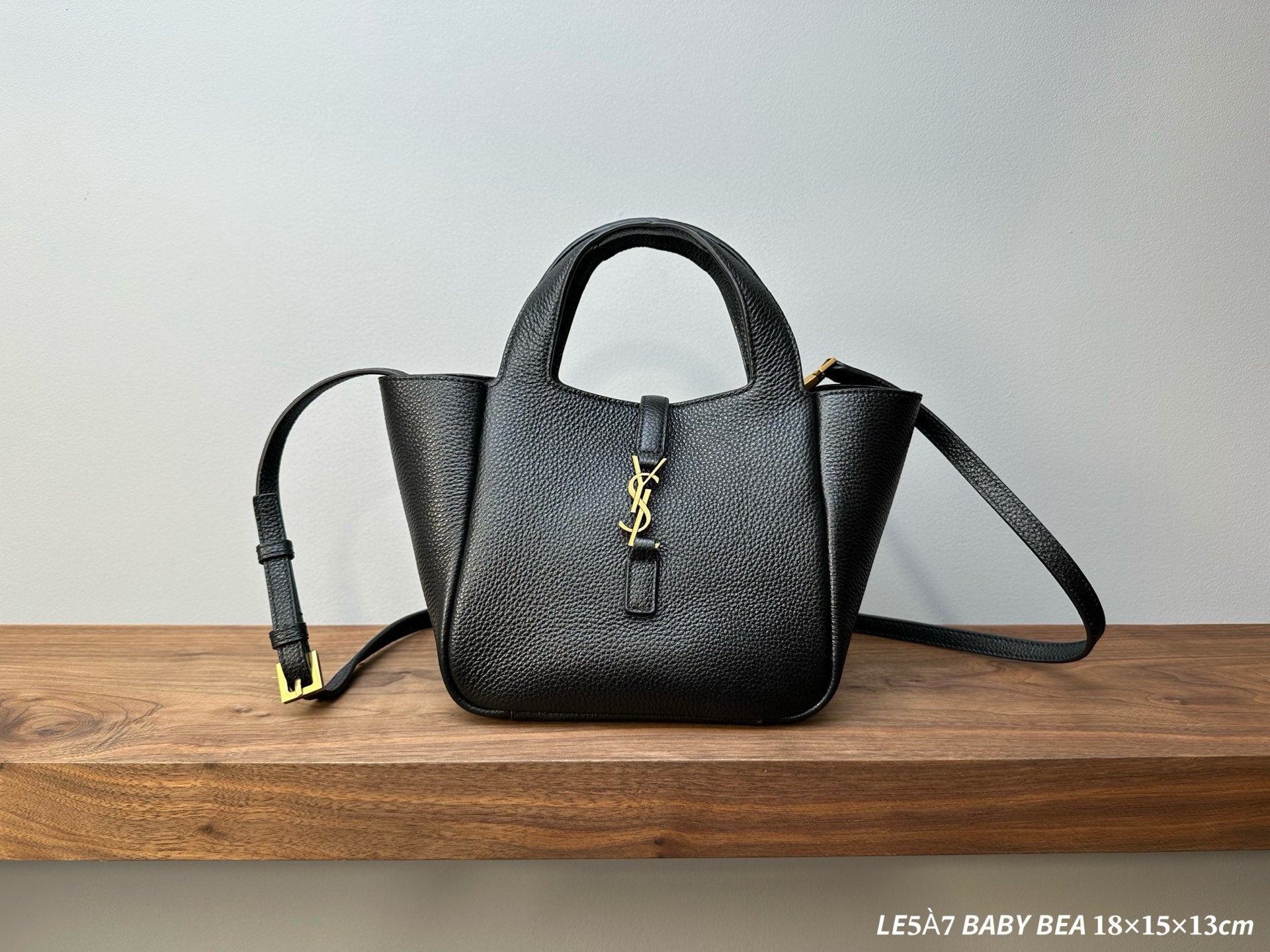 YSL mini leather tote bag, black textured, top handle, front YSL logo, gold hardware