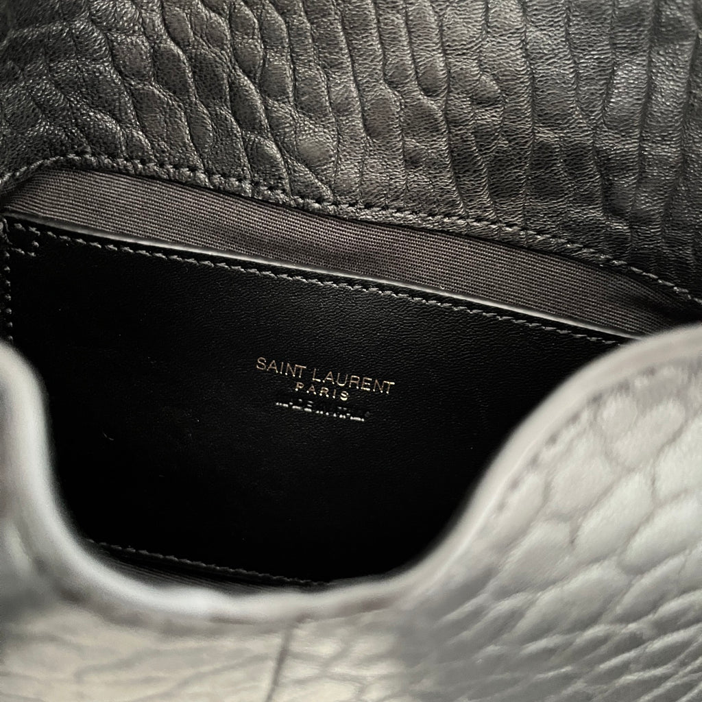 Black interior pocket with YSL logo stamp