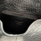 Black interior pocket with YSL logo stamp