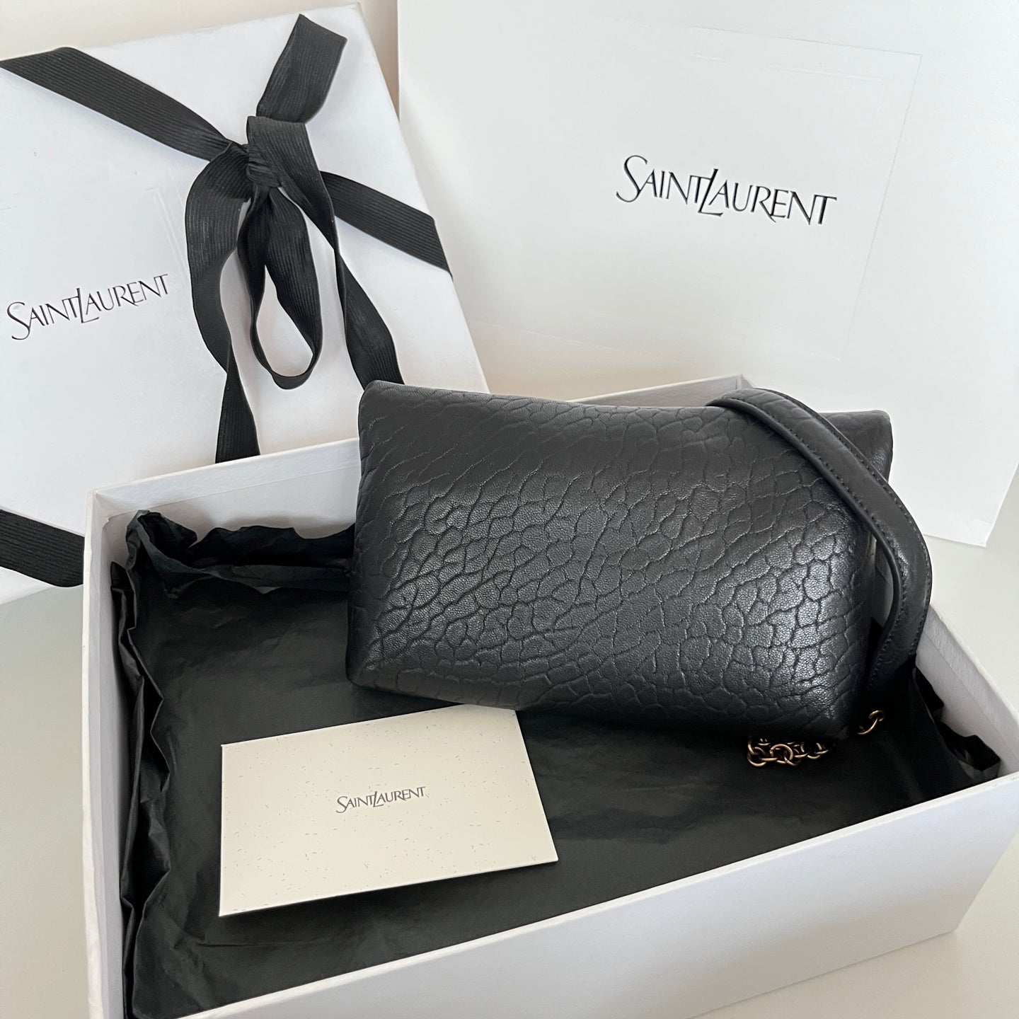 Black textured leather YSL shoulder bag with gold chain strap and front flap