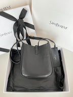 YSL bag, black pebbled leather with top handle and front monogram