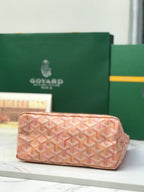 Pink Goyard-style canvas rectangular clutch with woven pattern and front pocket