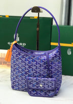 Purple patterned Goyard hobo bag with side handle strap and front flap pocket