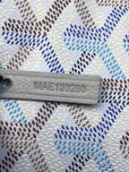 Goyard bag serial stamp 'MAE120250' on a light leather patch
