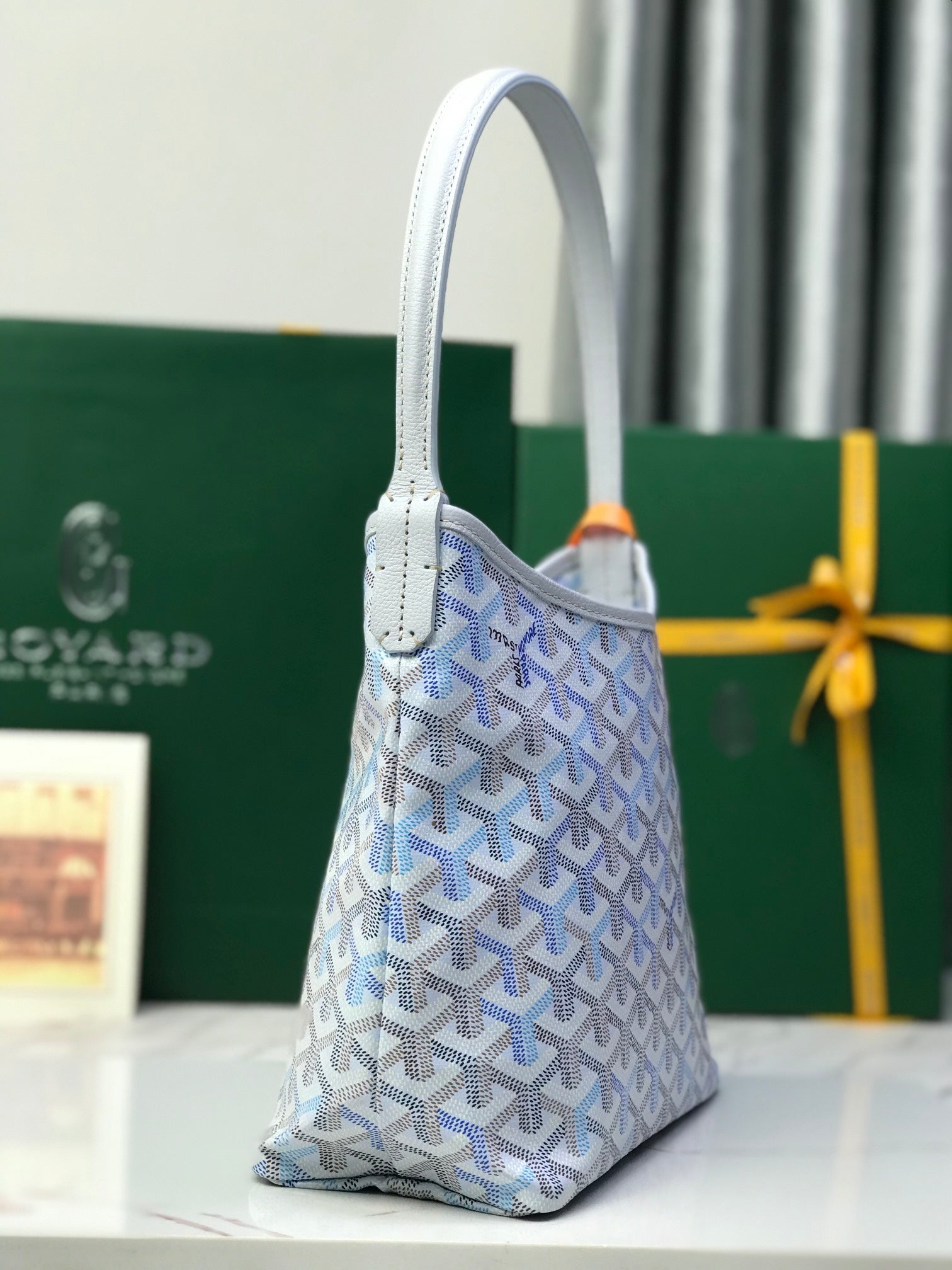 Goyard small tote bag in light blue with Goyardine pattern and curved handles
