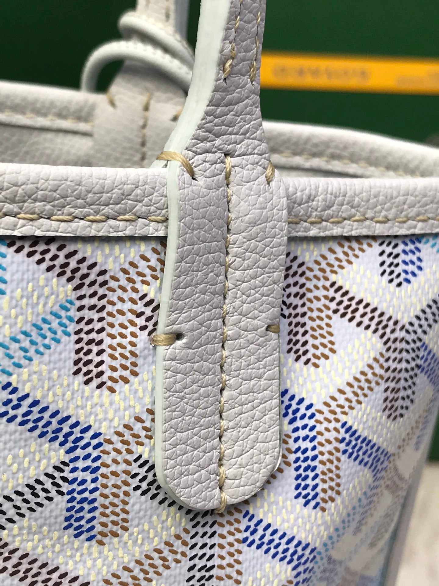 Goyard tote strap and textured leather trim with monogram patterned fabric