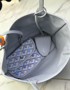 Goyard tote interior with small matching pouch and top pull tab loop
