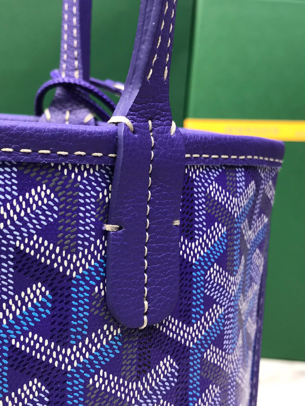 Goyard purple monogram tote bag with front tab strap and stitched edging