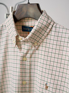 Ralph Lauren plaid button-up shirt close-up showing point collar and front buttons