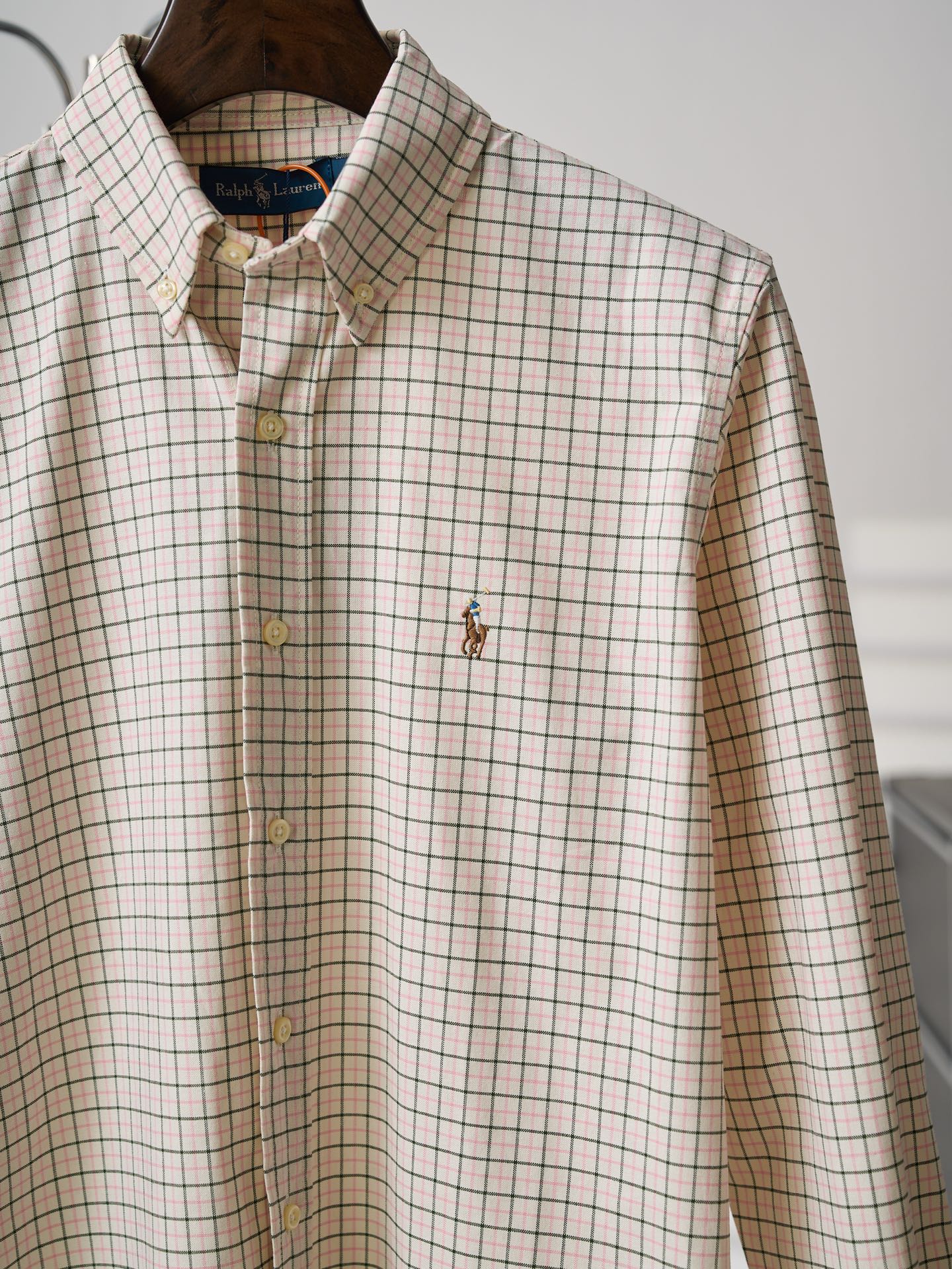 Ralph Lauren plaid button-up shirt front close-up with long sleeves and embroidered logo