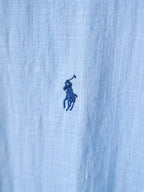 Light blue fabric with small navy pony logo on the chest