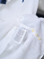 Ralph Lauren white button-up shirt, fabric label on chest