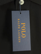 Black polo shirt with POLO Ralph Lauren retail tag hanging from collar