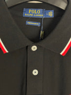Black polo shirt collar and button placket with red and white trim