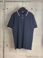Navy Polo Ralph Lauren polo shirt with red-and-white striped collar and 2-button placket