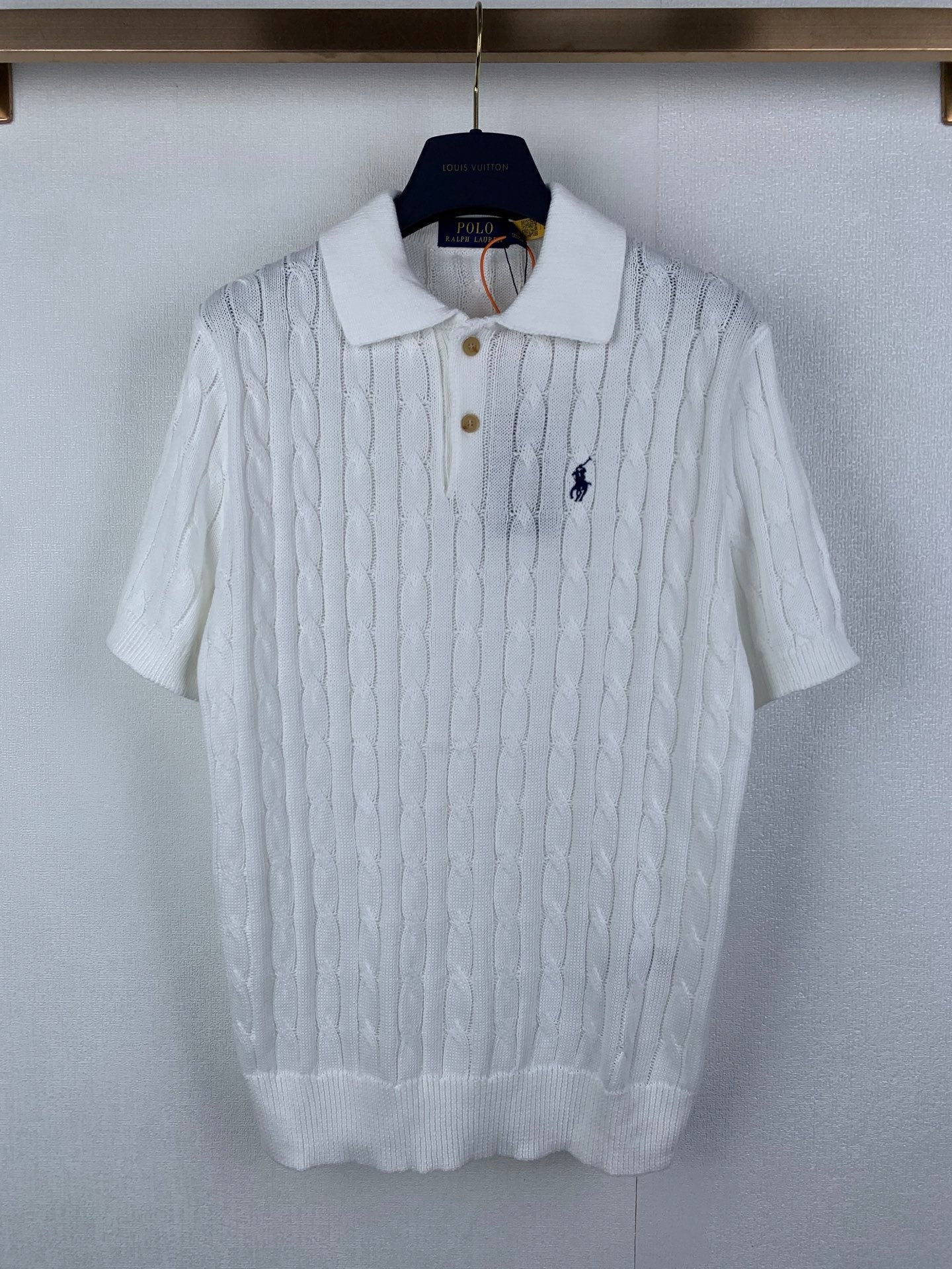 Ralph Lauren white cable-knit polo shirt with short sleeves and button placket