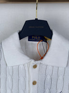 White cable-knit polo shirt collar with button placket and small embroidered logo