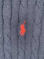 Dark navy cable-knit polo front with red horse logo