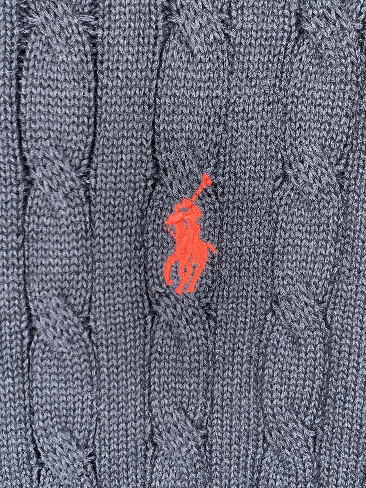 Dark navy cable-knit polo front with red horse logo
