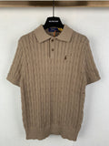 Ralph Lauren cable-knit polo shirt with short sleeves, button placket, and small chest logo