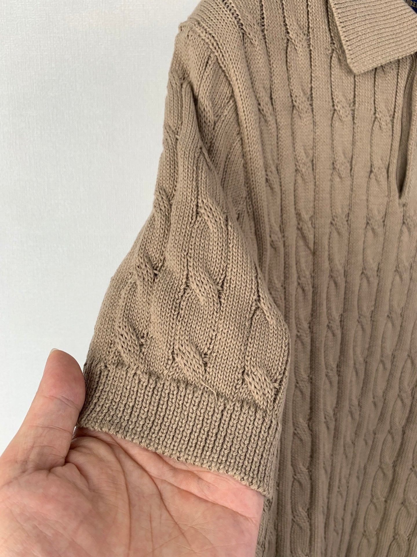Ralph Lauren knit polo sleeve and hem detail with ribbed cuffs and textured cable pattern