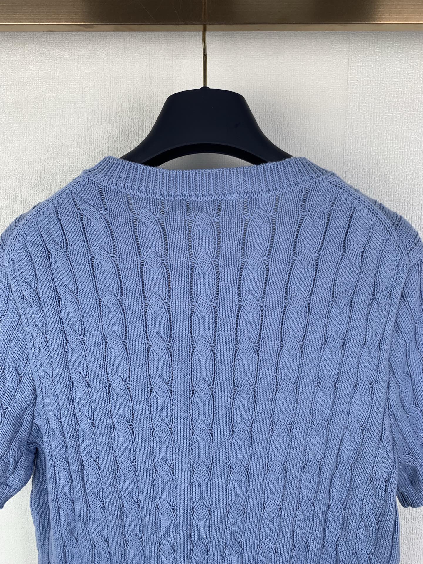 Light blue Polo Ralph Lauren knit sweater back, ribbed crew neck and cable knit