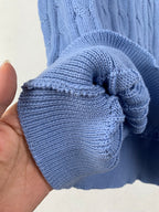 Light blue knit sweater folded cuff with ribbed hem detail