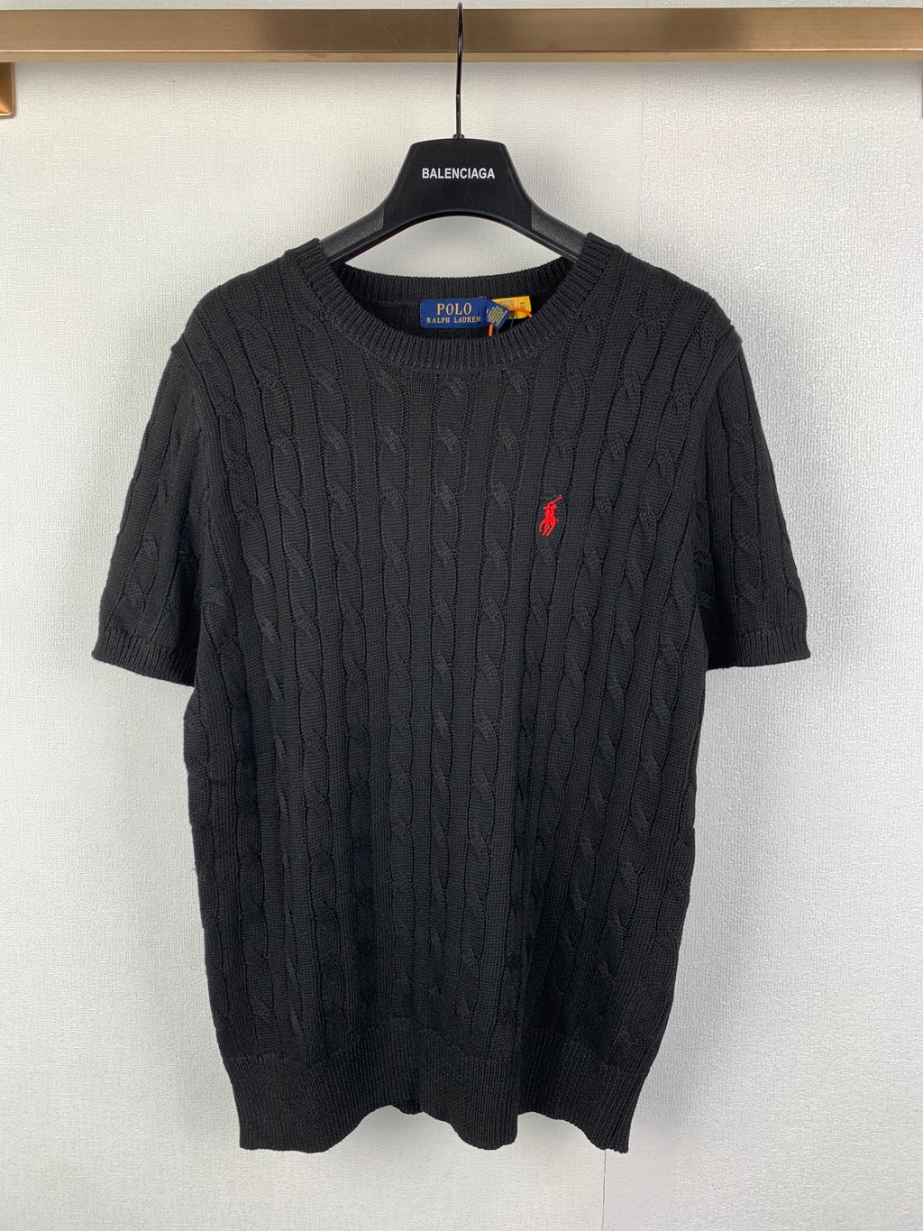 Ralph Lauren cable-knit sweater, dark knit with small red logo on chest