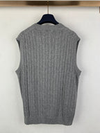 Gray knit sleeveless sweater vest, cable texture, V-neck and ribbed hem