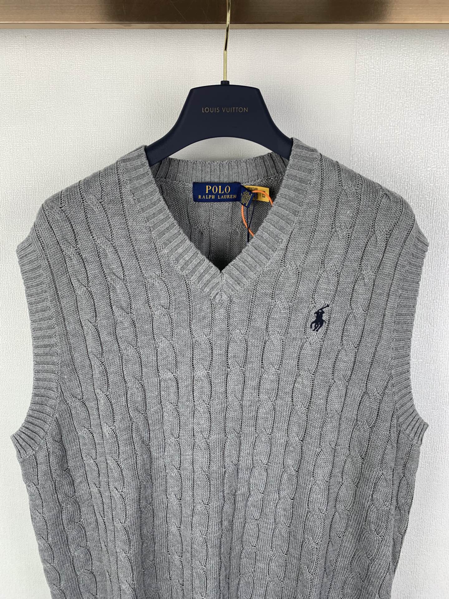 Gray cable-knit sleeveless sweater vest with V-neck and Polo logo detail
