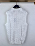 White cable-knit sweater vest with ribbed crew back collar