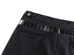 Black pants waistband close-up with button details and belt strap